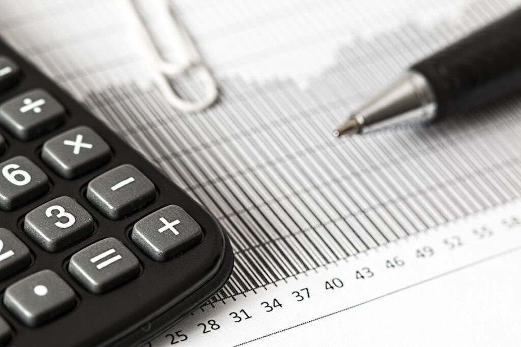 Calculator with tax documents — how to reduce income tax liability in India legally